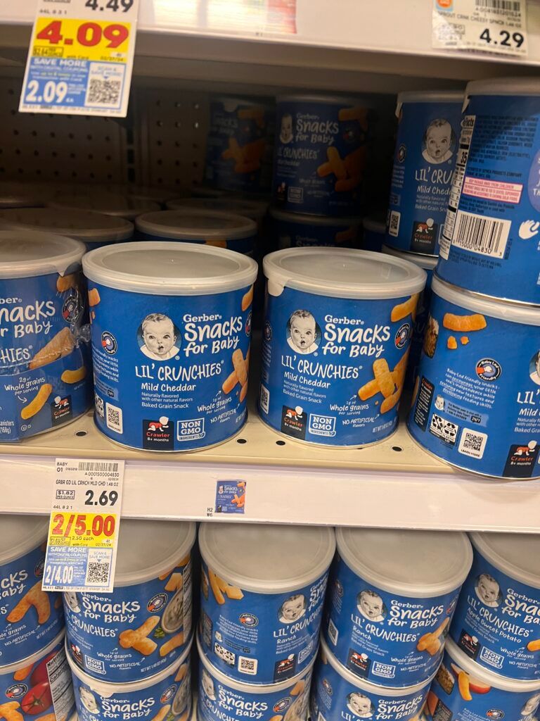 A shelf full of baby food in a store.