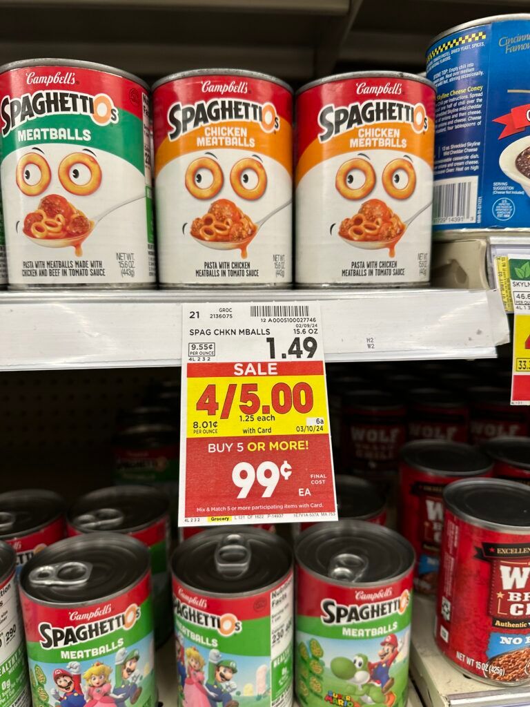 Spaghetti and meatballs are on sale at a grocery store.