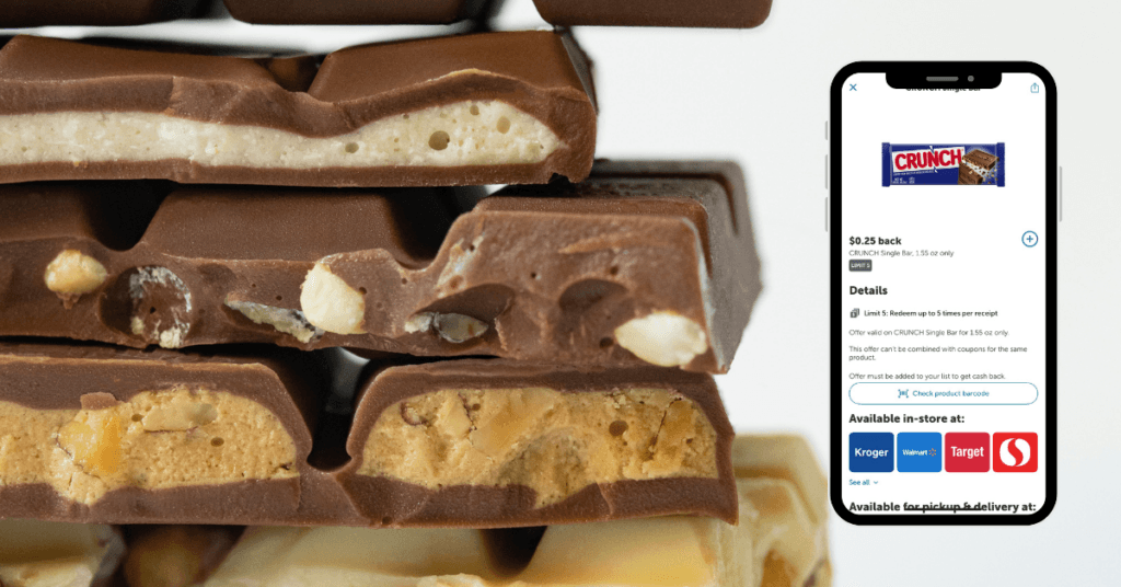 A stack of chocolate bars and an phone with a rebate app on the screen.